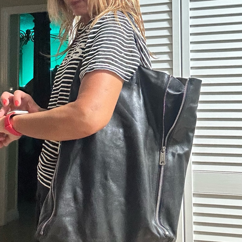 Sleek Black Leather Tote by [Brand] Celine